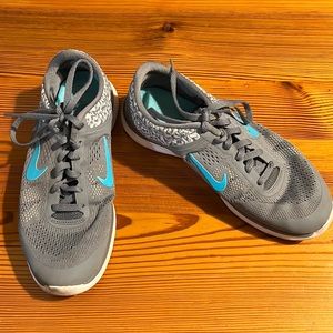 Gray and blue Nike running shoes size 6